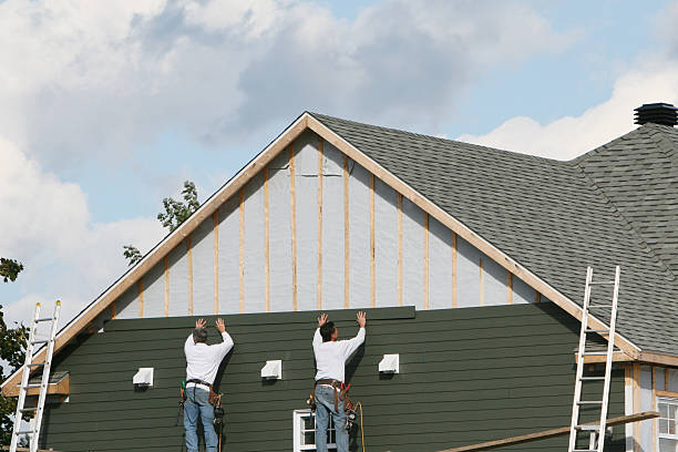 Professional Emergency Siding Repair technician working in Highland, MD